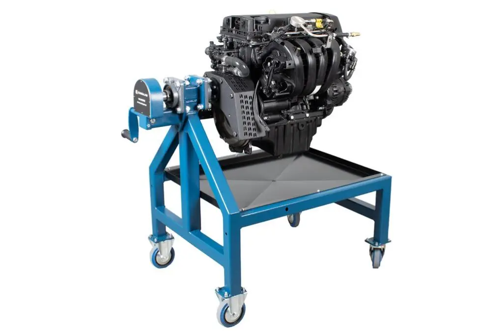 This test rig is designed for teaching spark ignition engine principles. It consists of a welded steel base plate and incorporates various components such as a mechanical brake or alternator to conduct performance experiments.